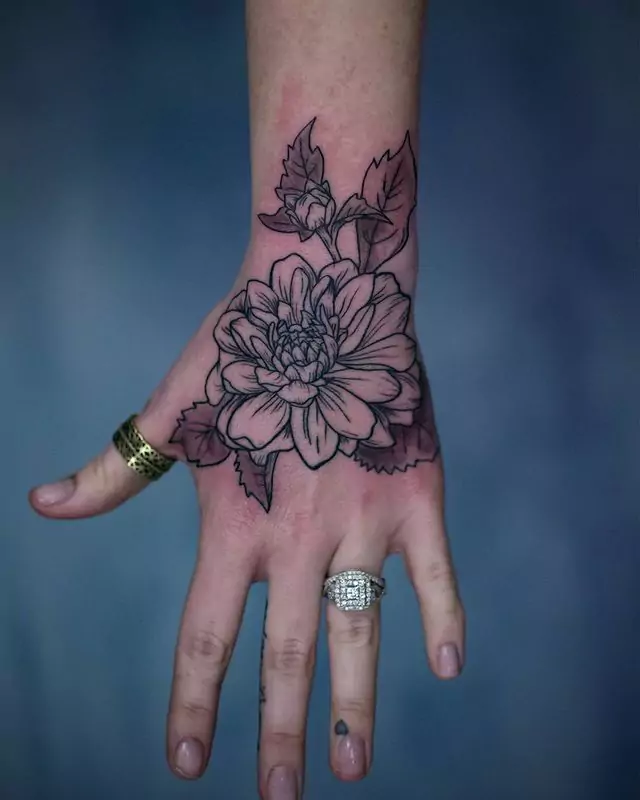 42 Spellbinding Flower Hand Tattoo Ideas You'll love [2024]