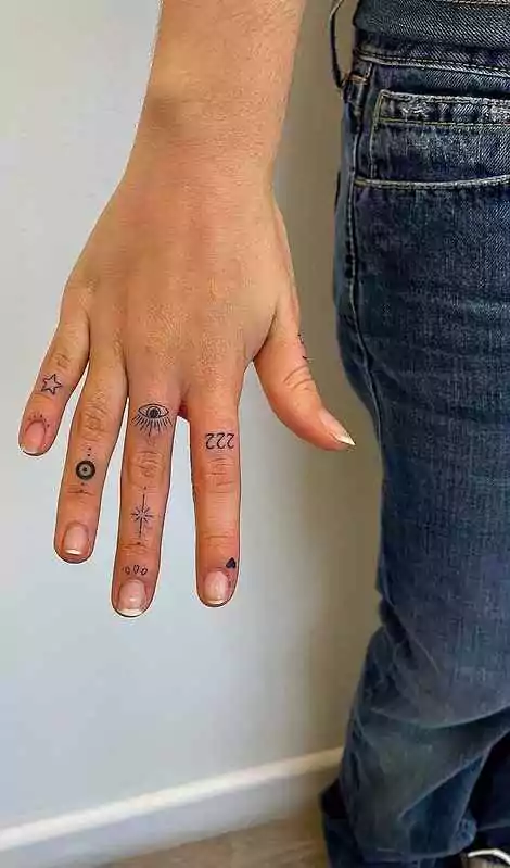 heart tattoo with 222 and eye