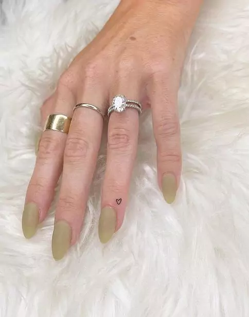 small black outline heart tattoo