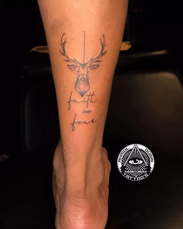 faith tattoo on the back of the leg