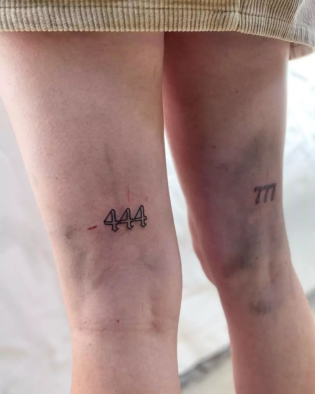 444 angel number leg tattoos