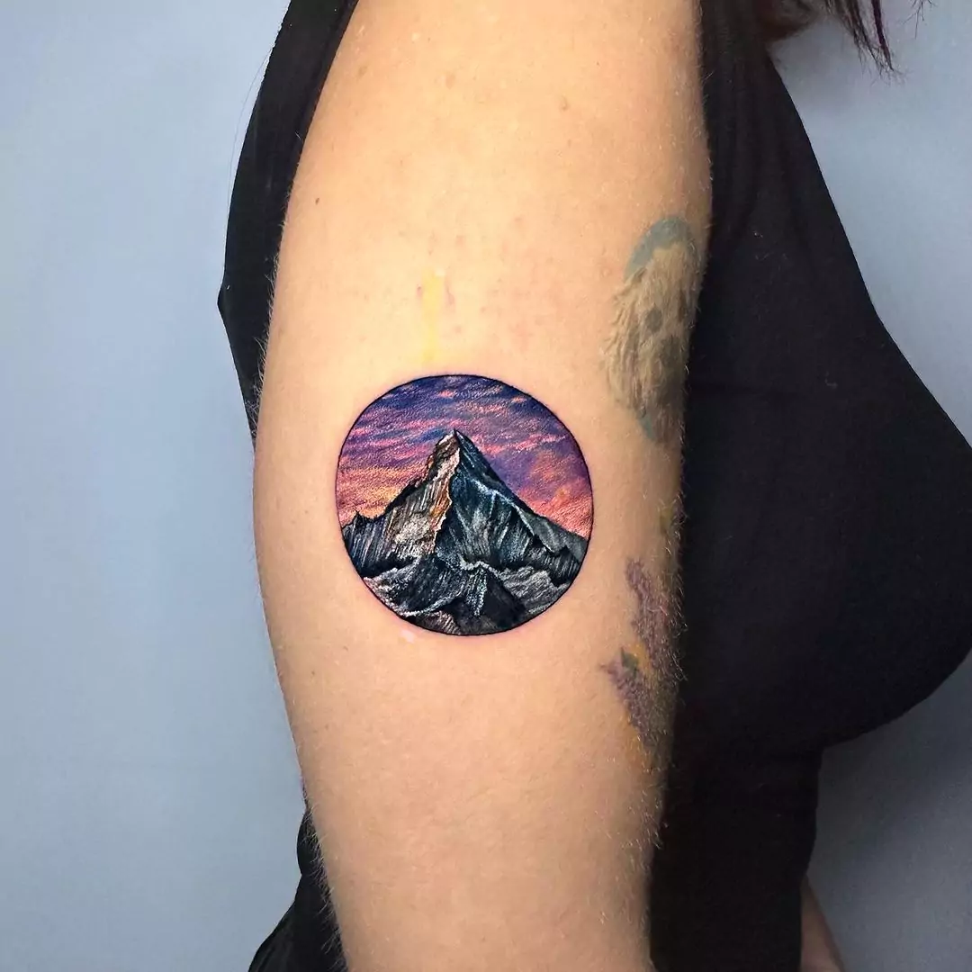 Micro realism mountain hand tattoo