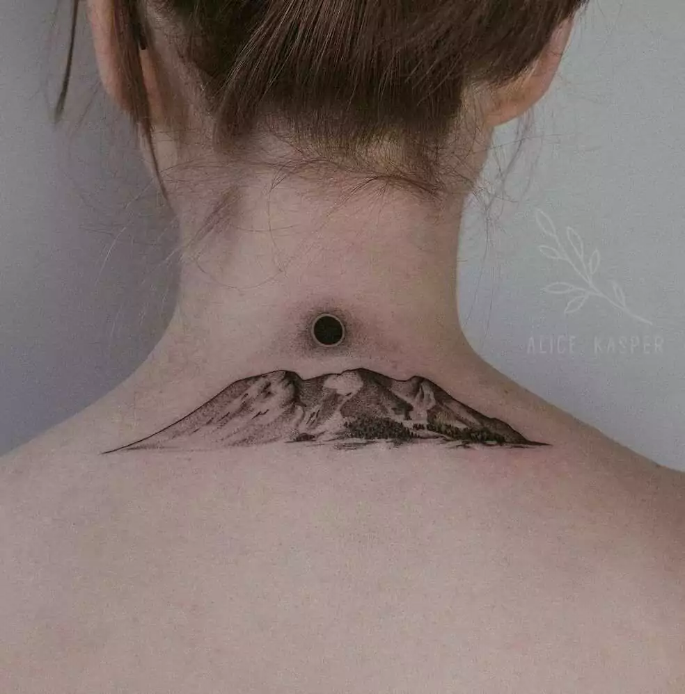 black mountain and sun tattoo on the neck