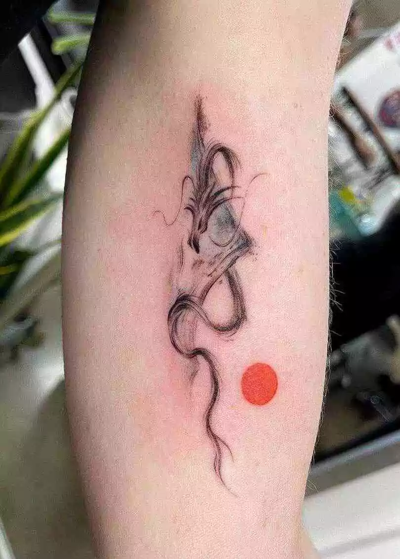 brush style mountain and dragon tattoo