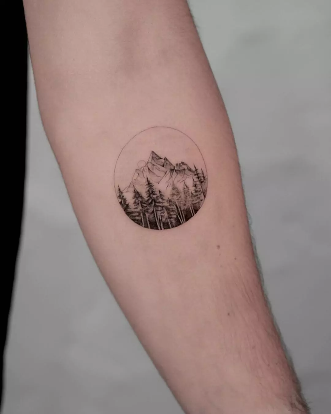 cute mountain tattoo inside circle