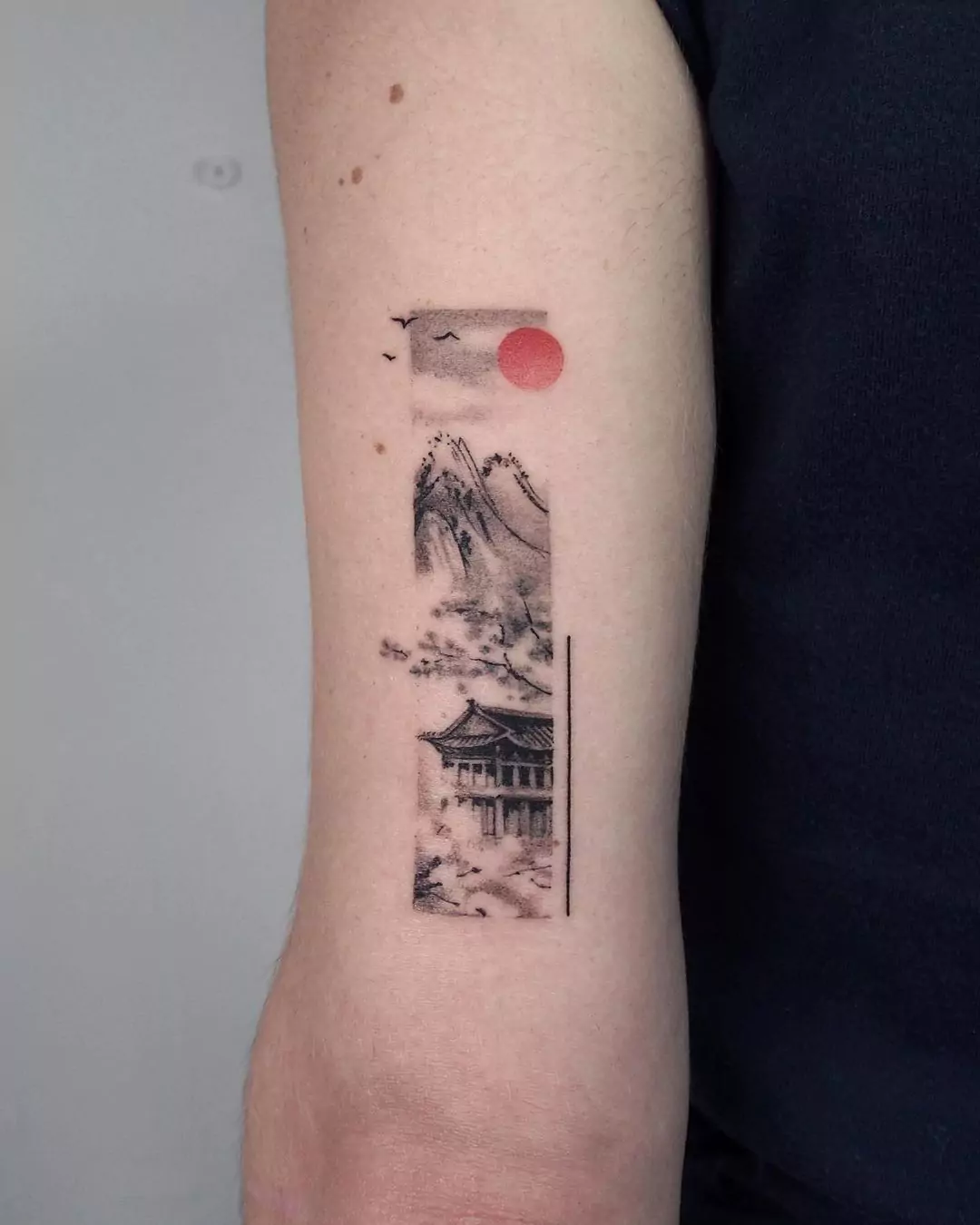 dark frame Japanese style mountain tattoo