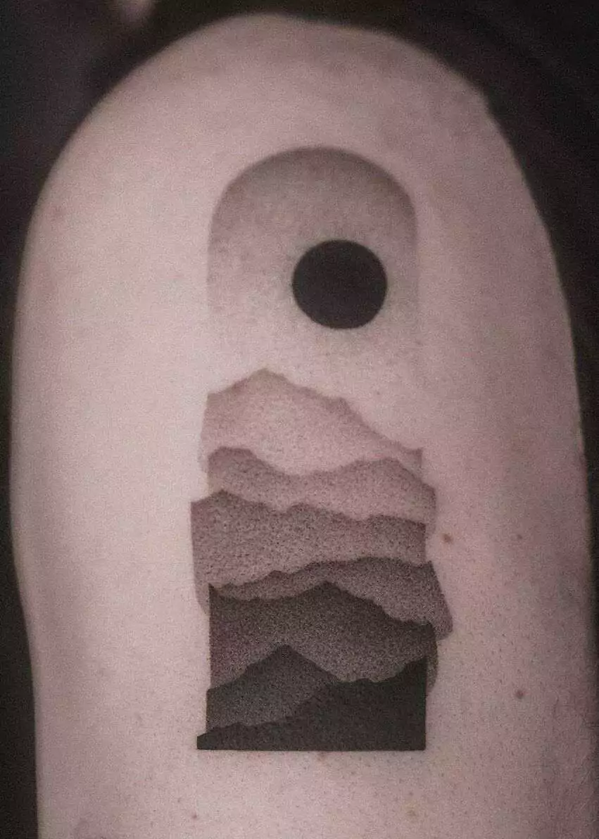 dot art mountain hand tattoo
