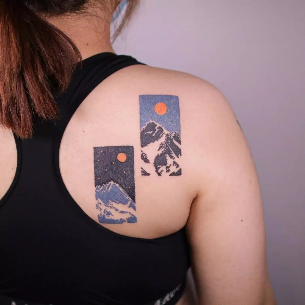 mountain frame tattoo on the back