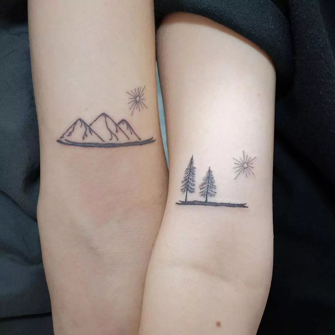 mountain hand tattoo for couples