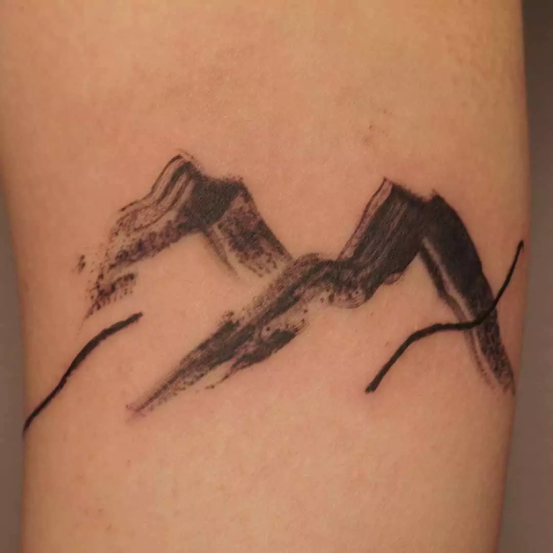 mountain tattoos in brush style