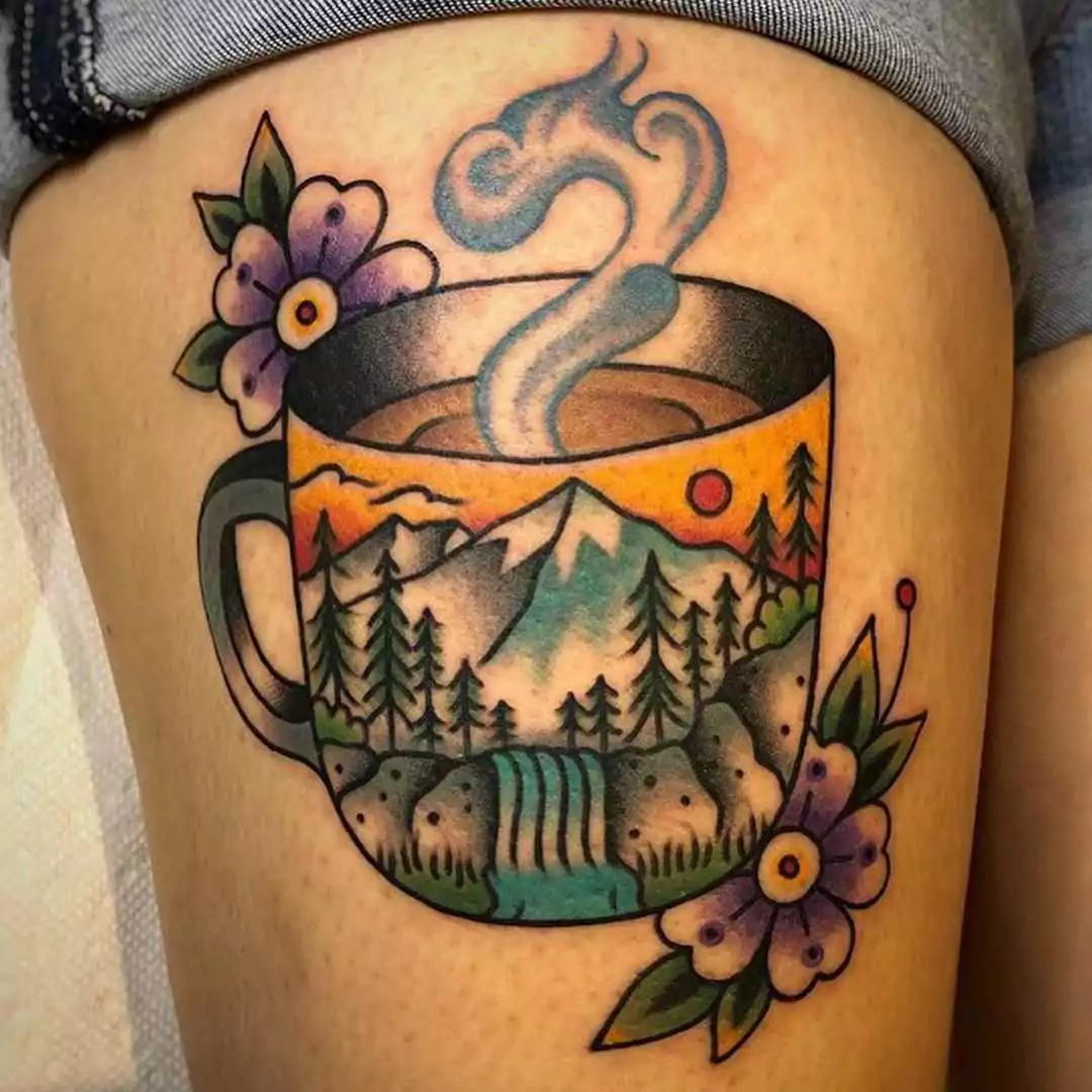 mountain tattoo on the coffee mug