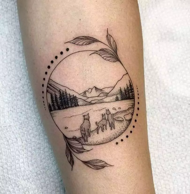 mountain tattoo with dogs