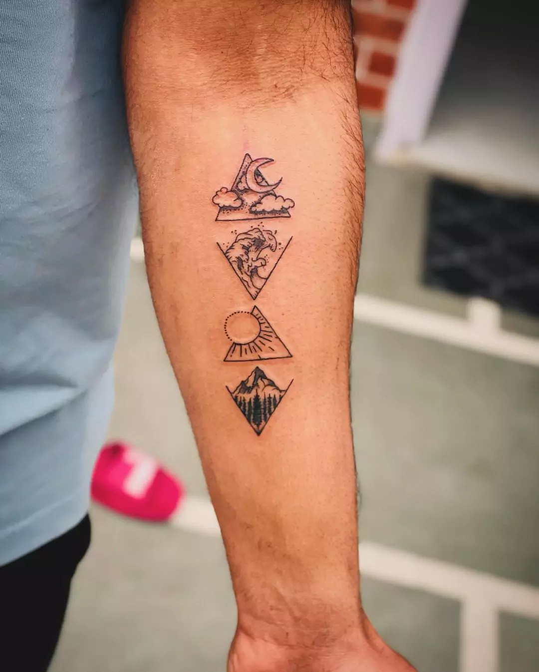 mountain tattoo with sun and moon