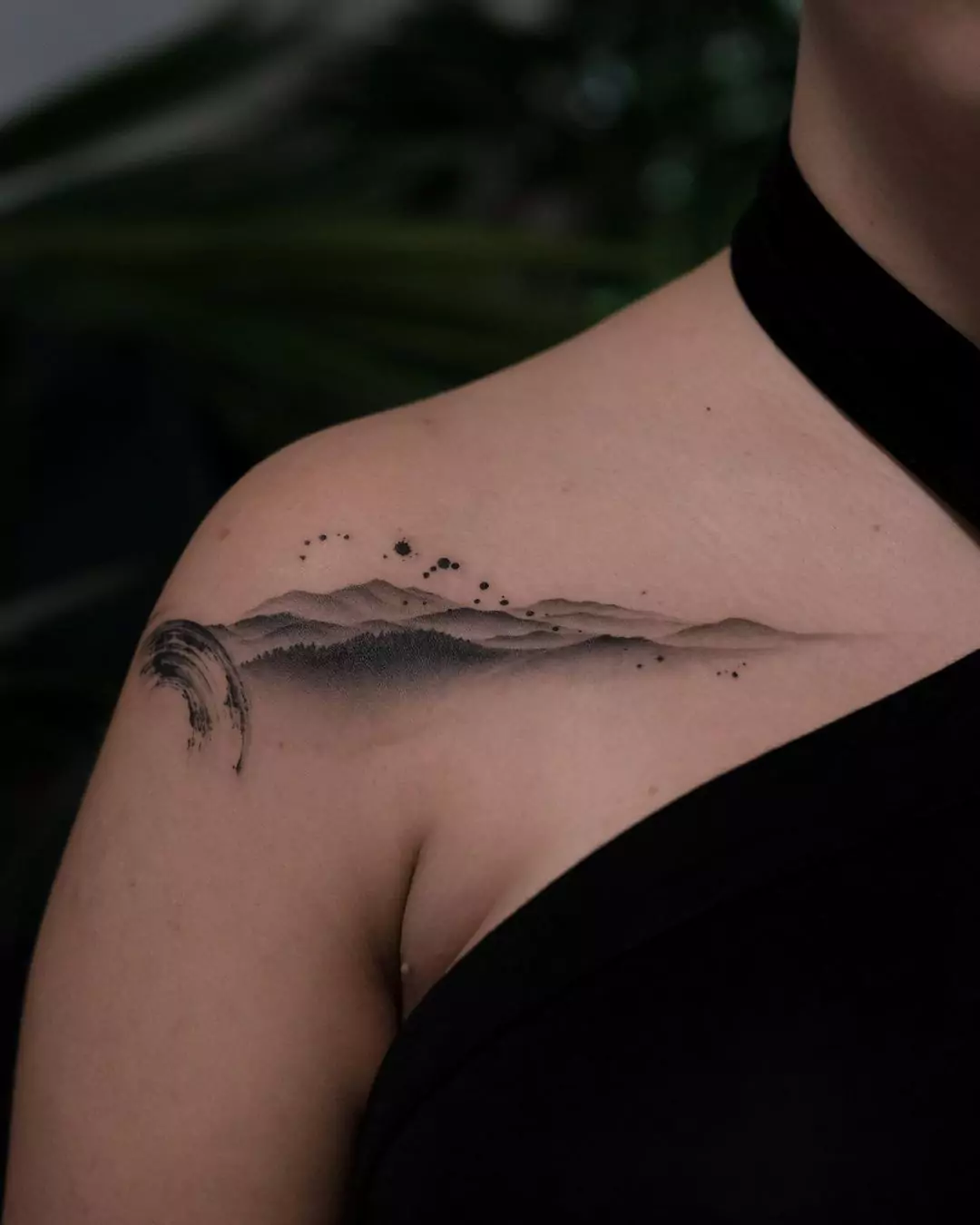 simple and subtle mountain shoulder tattoo