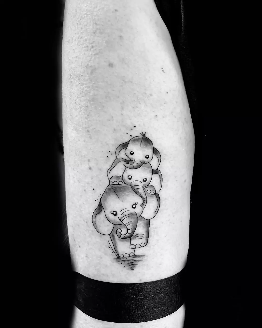black and gray baby elephants tattoo