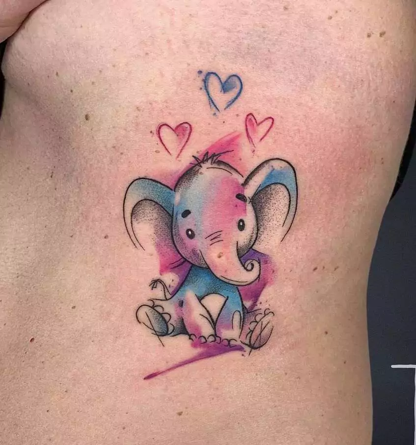 colorful baby elephant tattoo on the rib