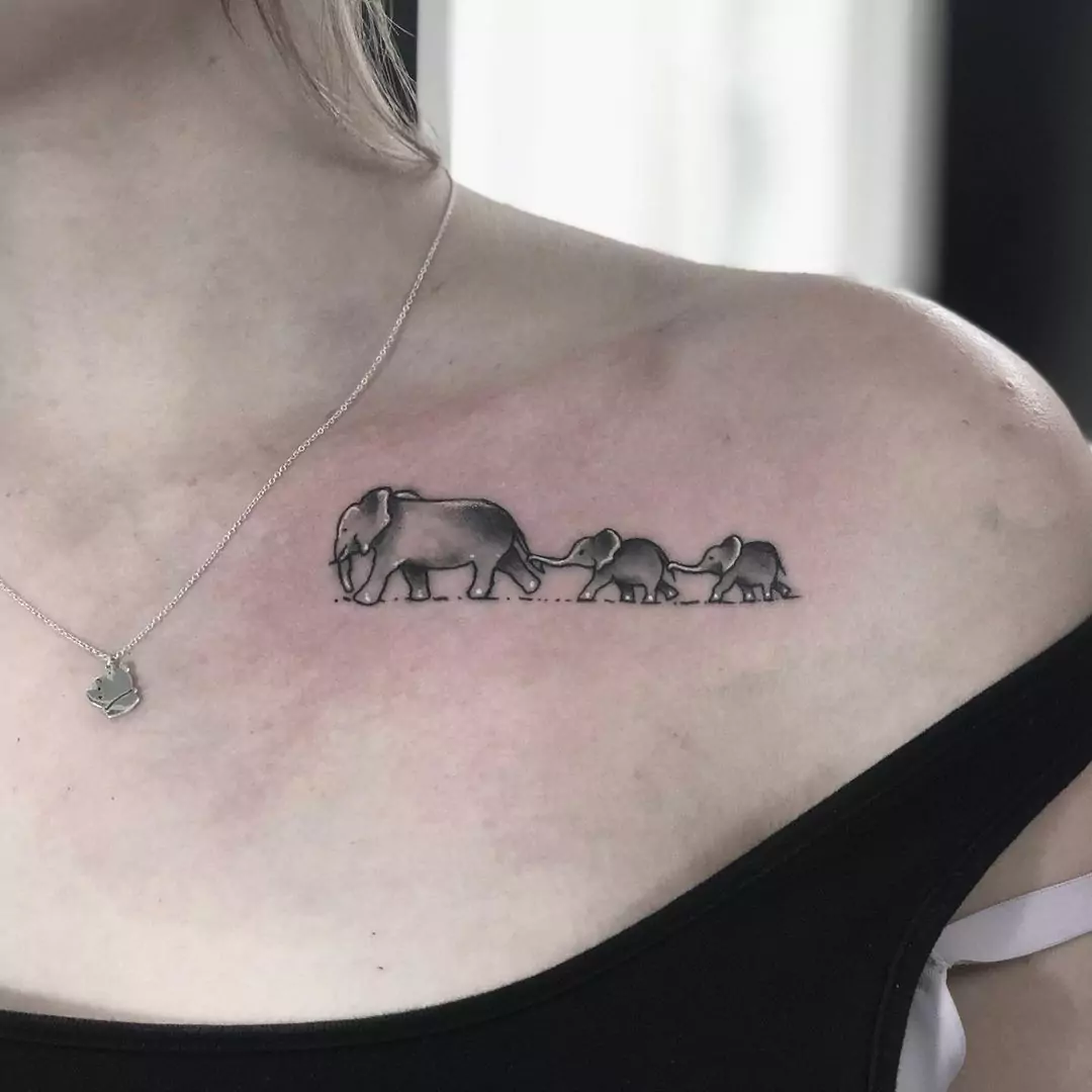 cute elephant collarbone tattoo