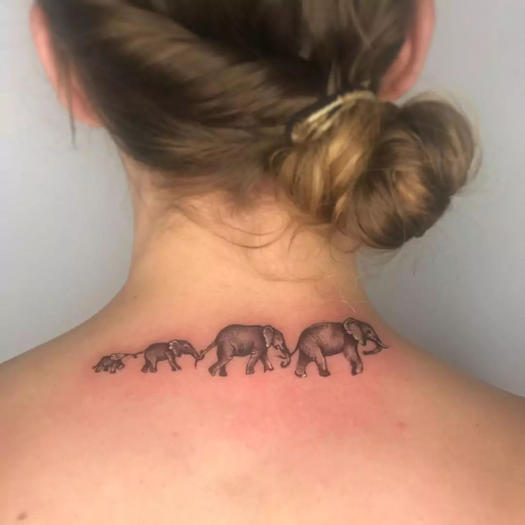 cute elephant tattoo on the neck