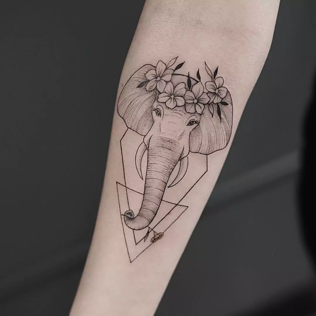 elephant tattoo with lines and floral