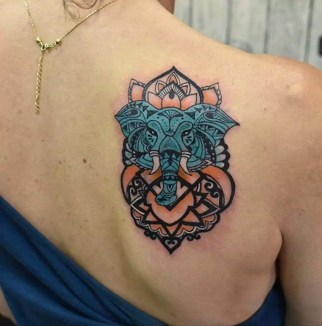 Ganesh tattoo in mandala style