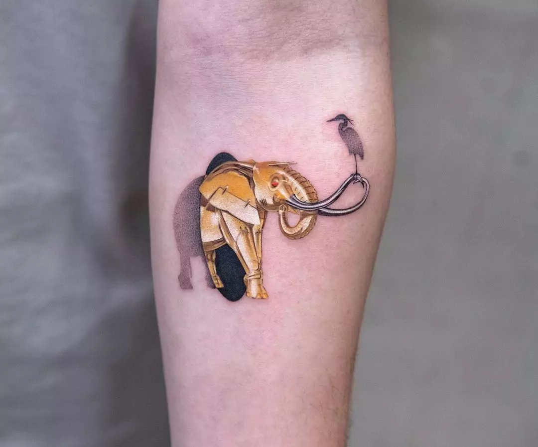 golden elephant tattoo