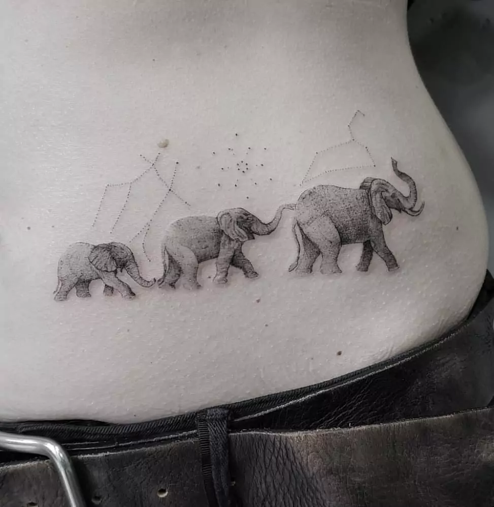 small elephant waist tattoo