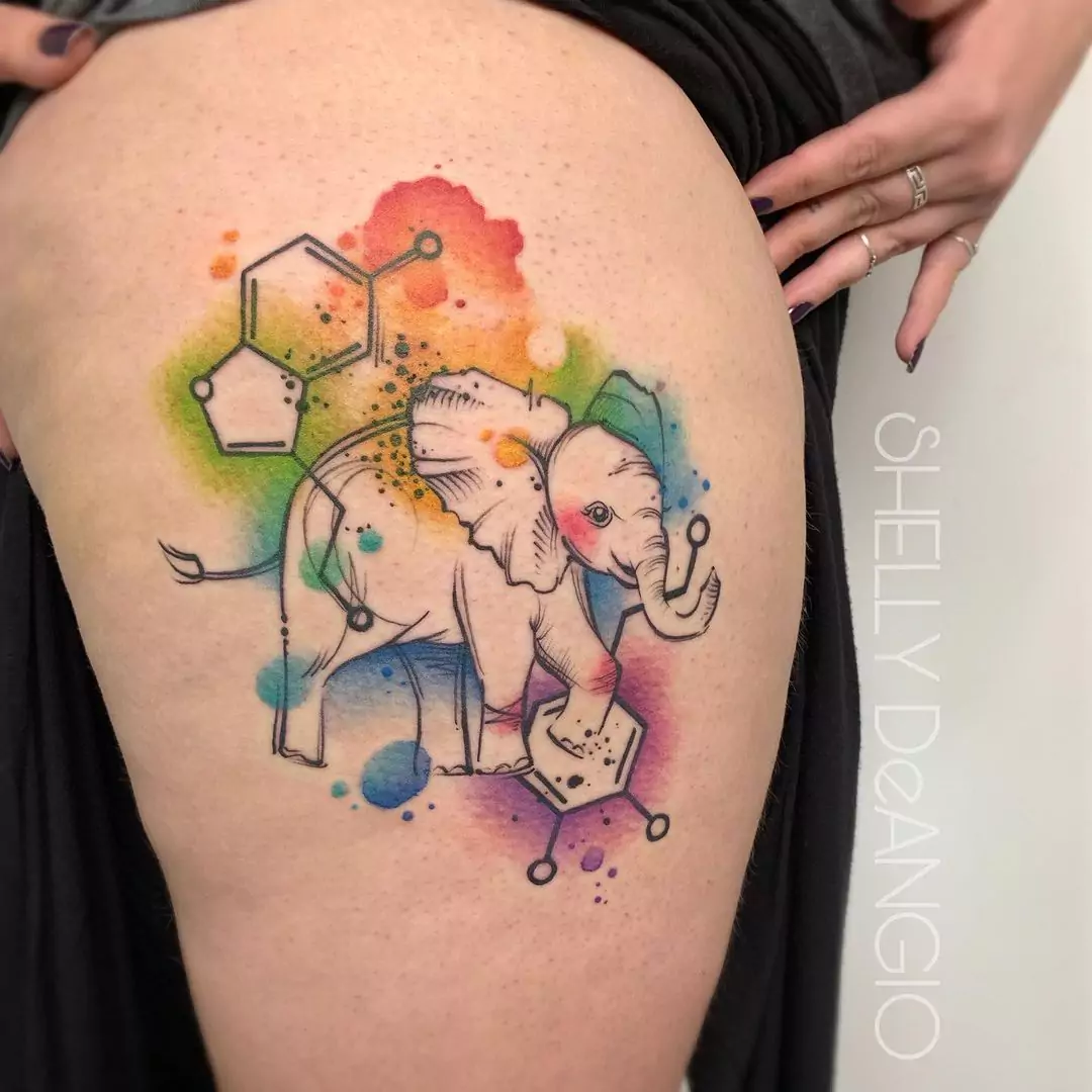 watercolor elephant tattoo with dopamine sign