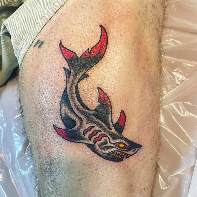 angry shark hand tattoo
