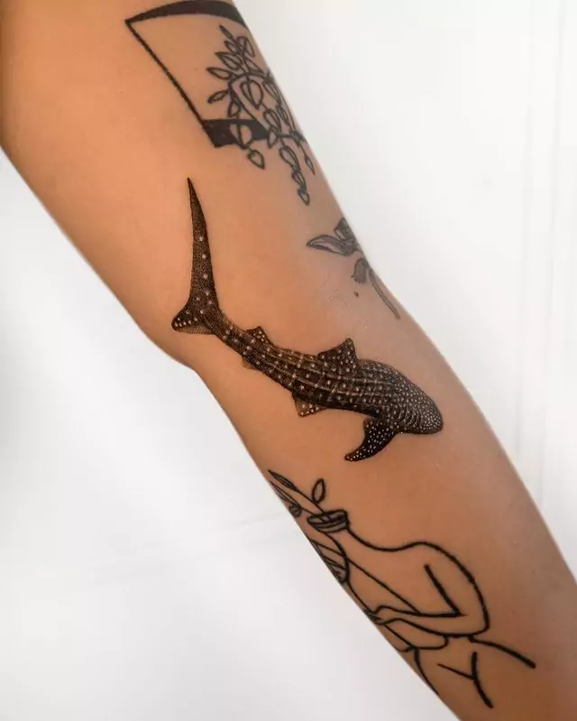 black whale shark hand tattoo