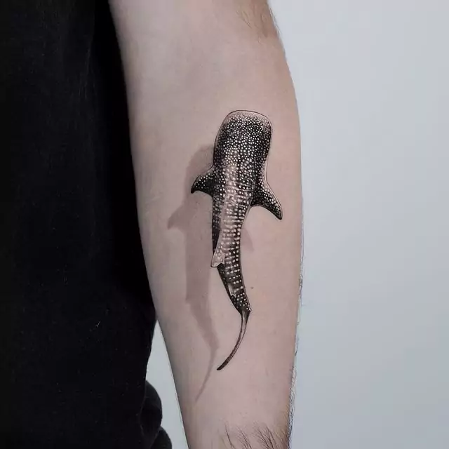 black whale shark tattoo on the hand
