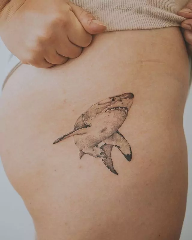 deadly shark leg tattoo