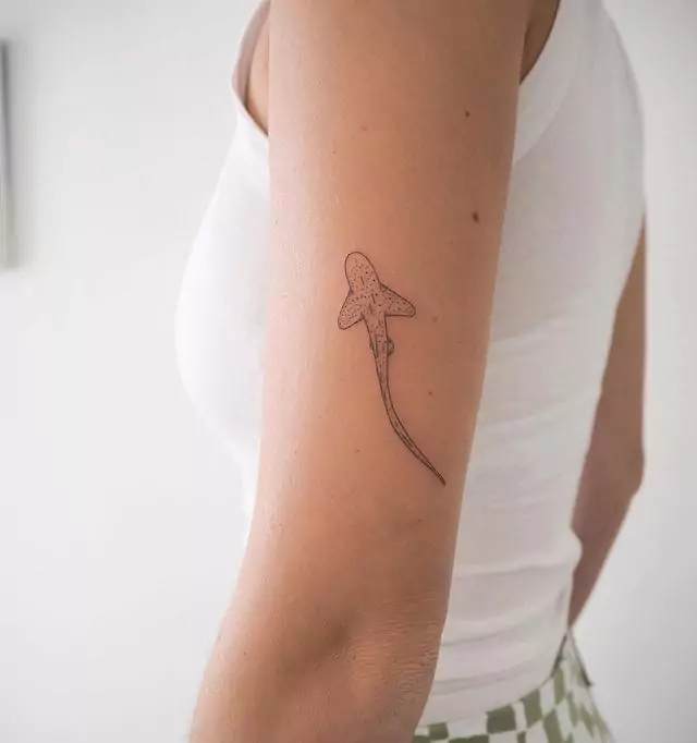 dot art shark tattoo on the arm