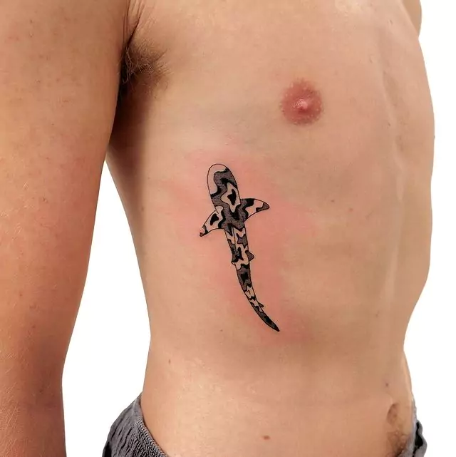 shark tattoo in camouflage style
