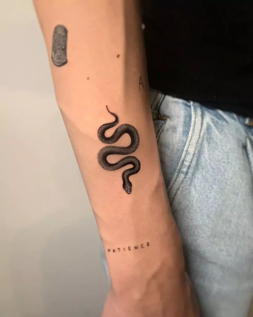 Simple Black Snake Hand Tattoo