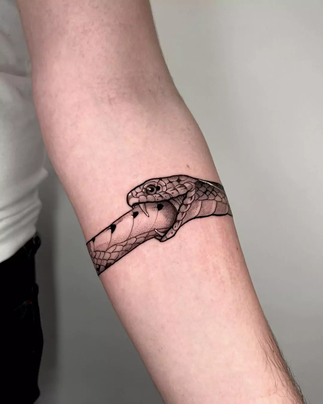 armband snake tattoo