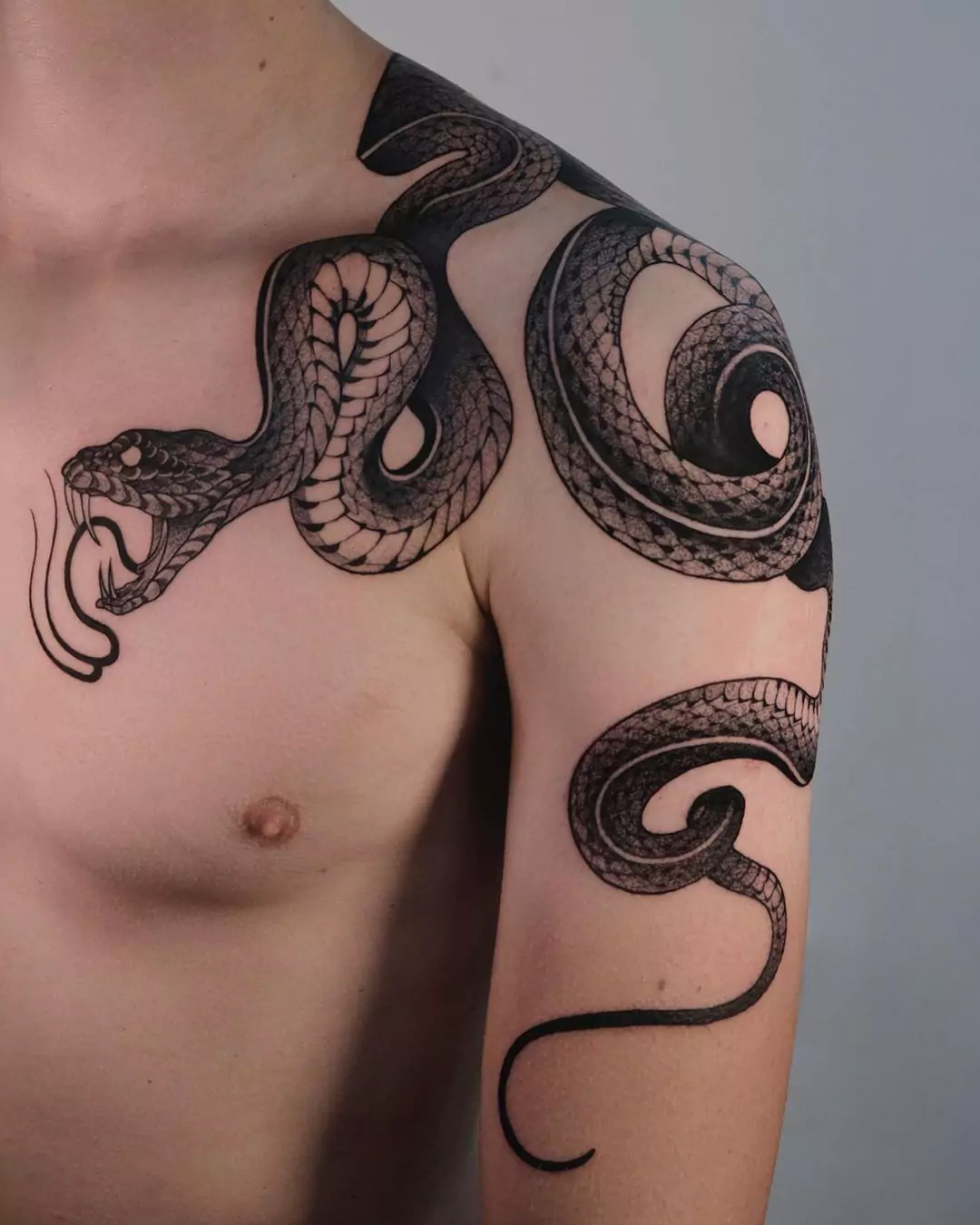 big snake shoulder tattoo