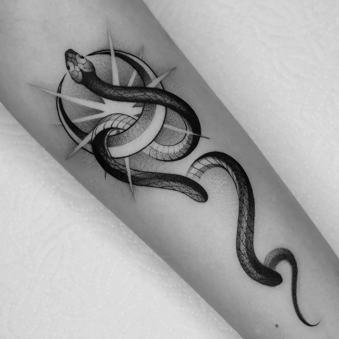 black snake and moon tattoo