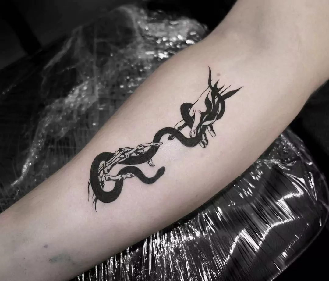 creation of Adam and snake tattoo