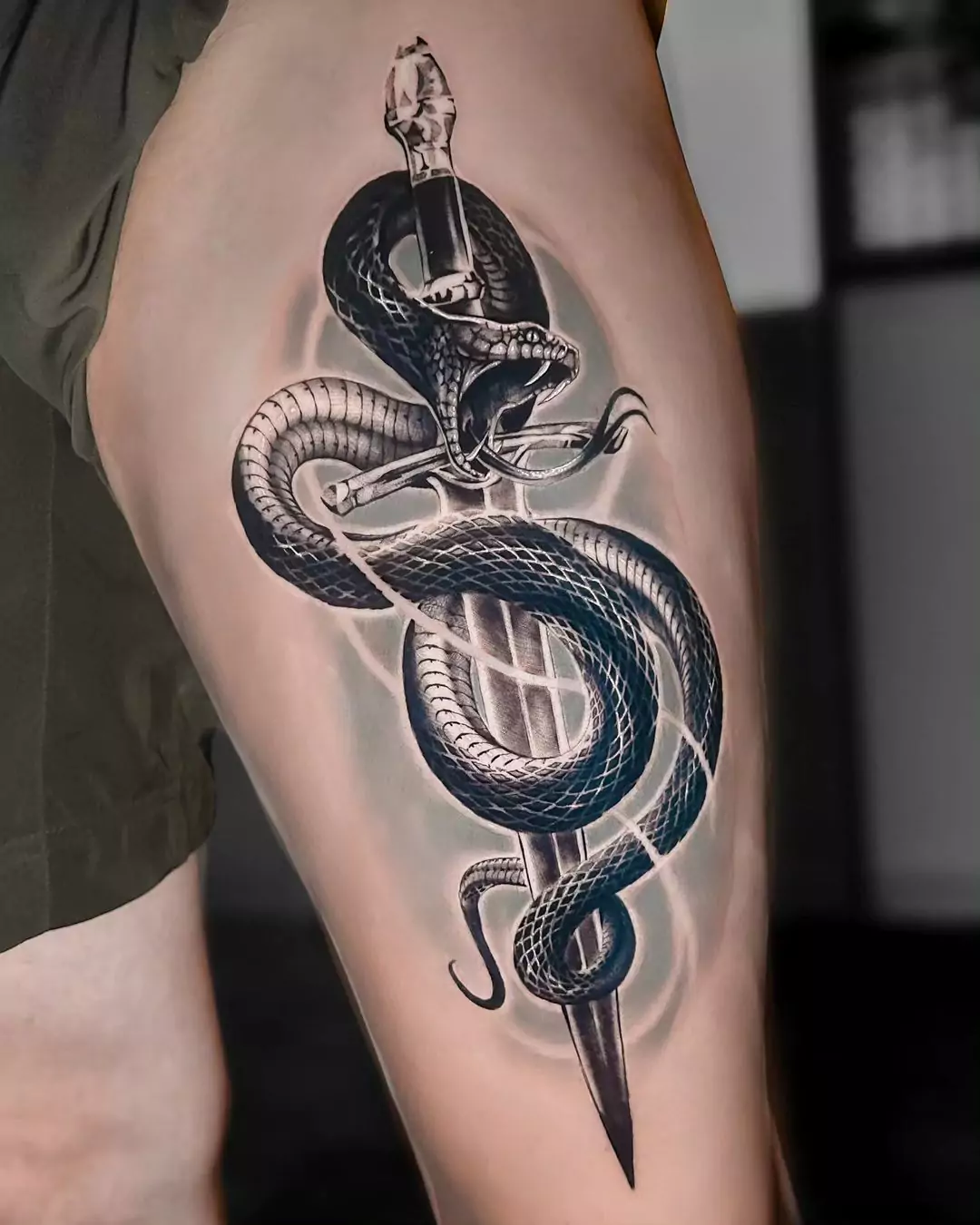 dagger and snake tattoo