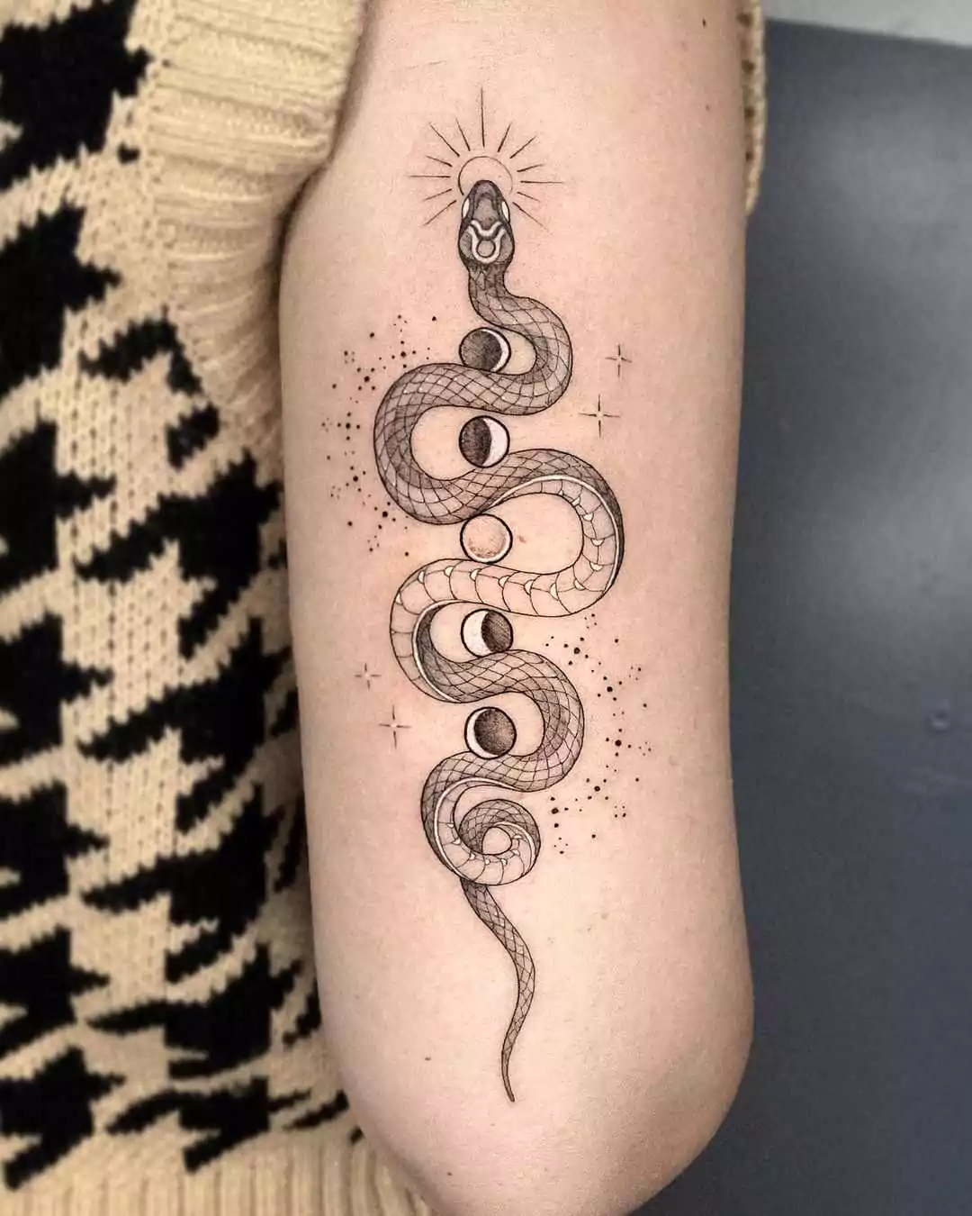 moon phases and snake tattoo