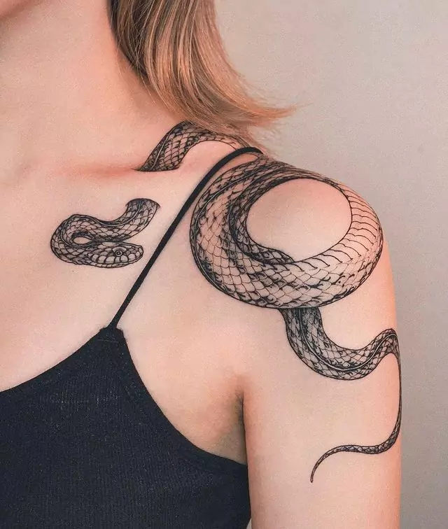 realistic snake shoulder tattoo