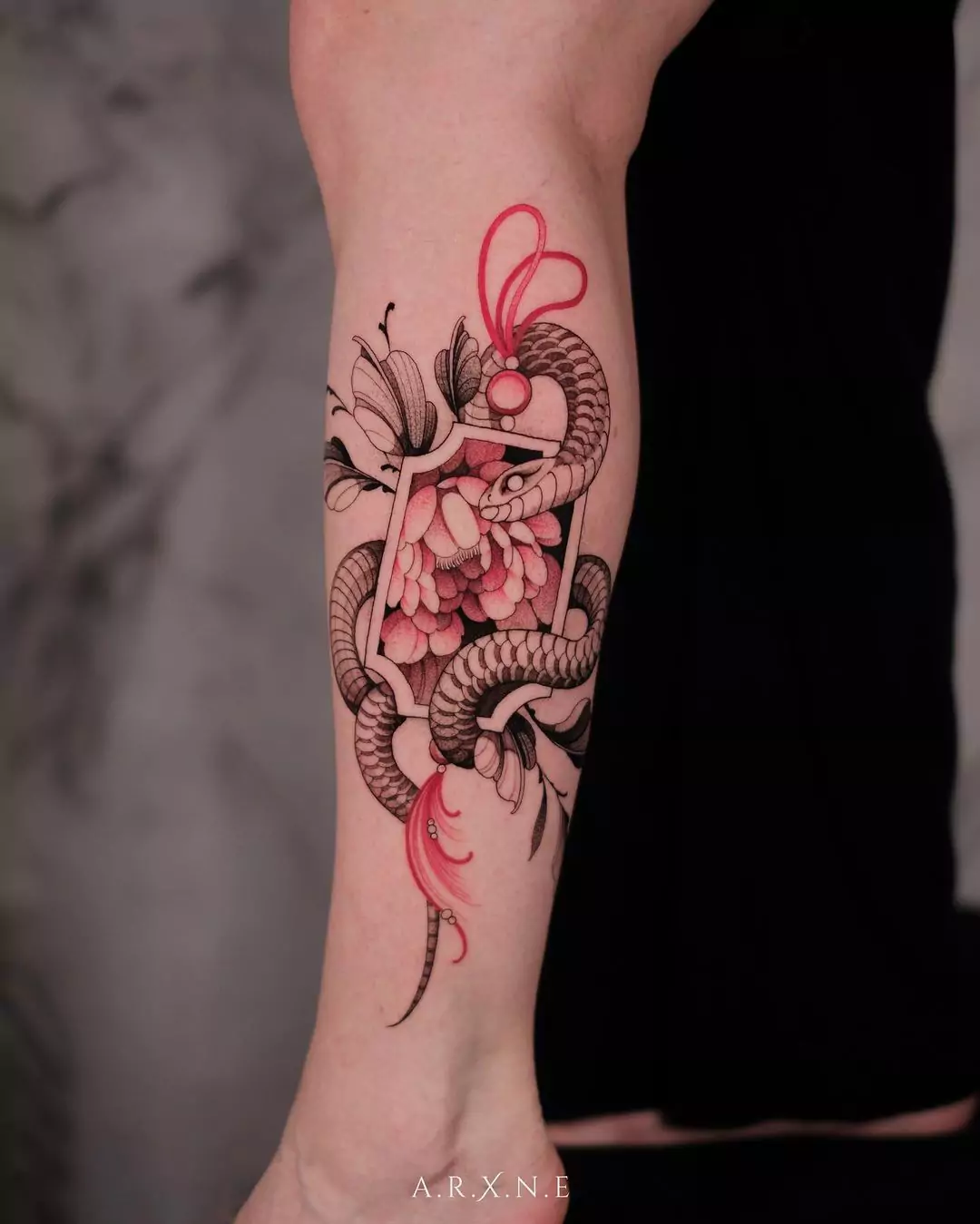 snake and flower tattoo in frame style