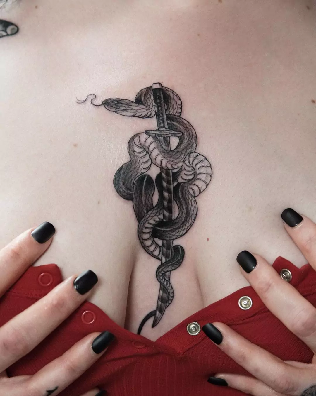 snake and katana tattoo for women