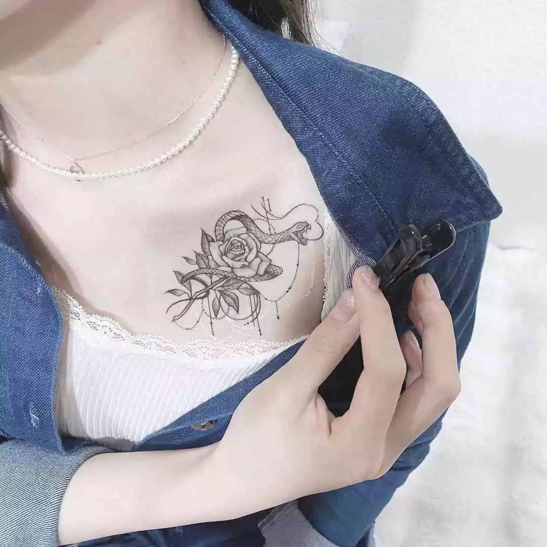 snake chest tattoo