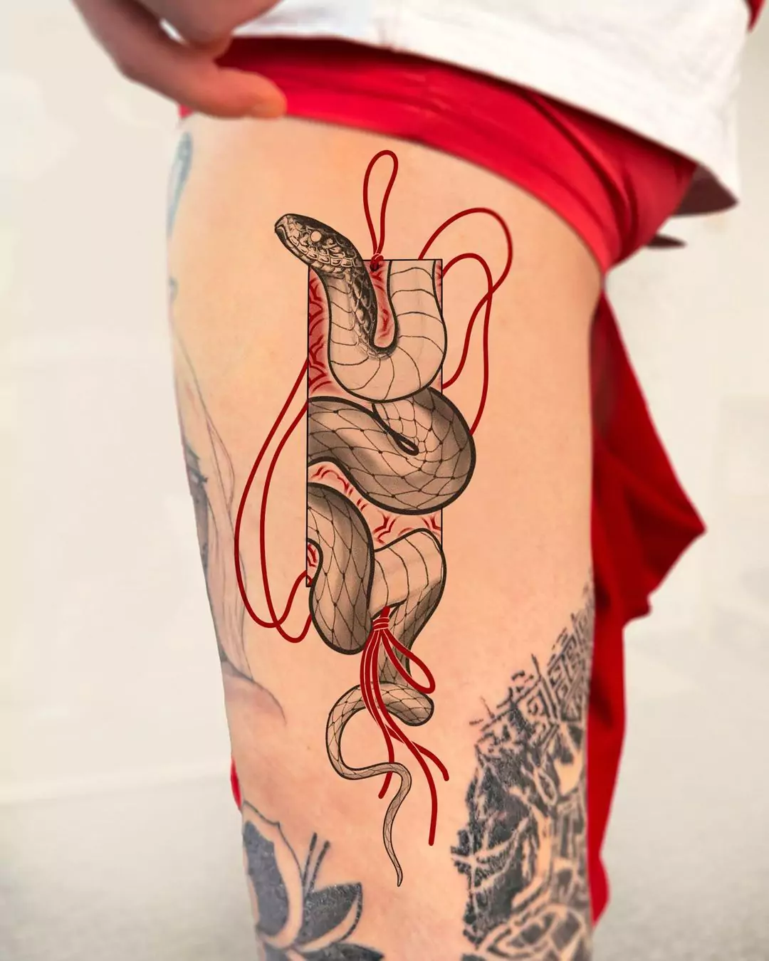 snake tattoo in frame style