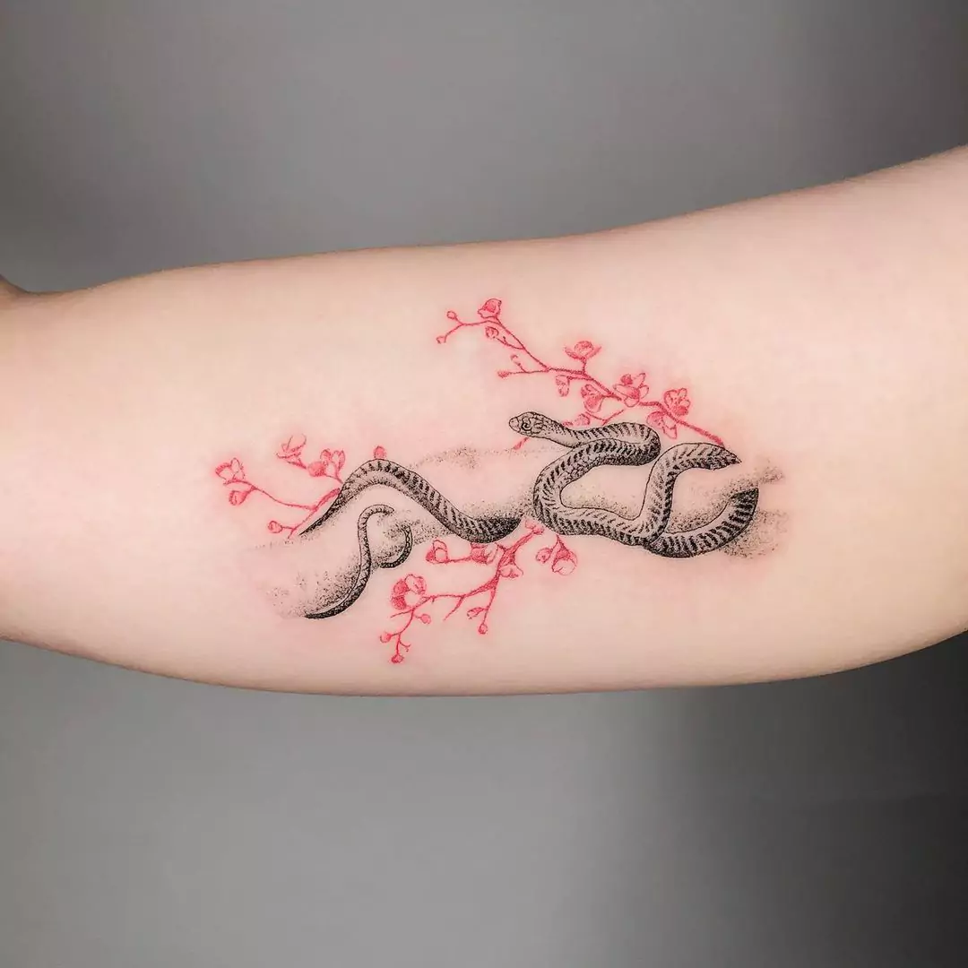 snake tattoo in the hand