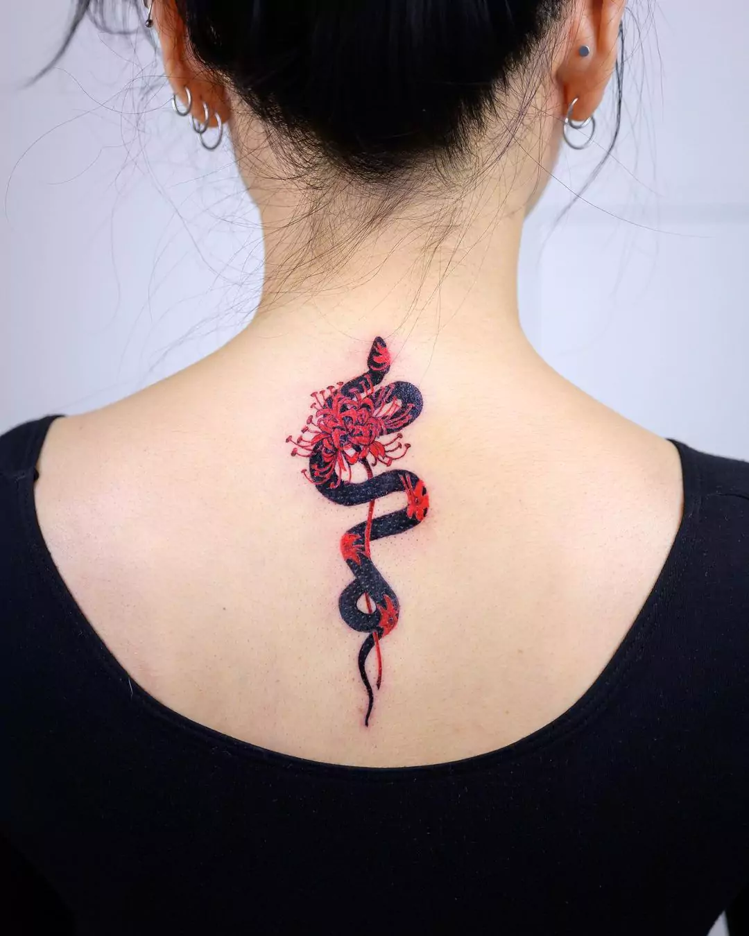 spider lily and snake tattoo