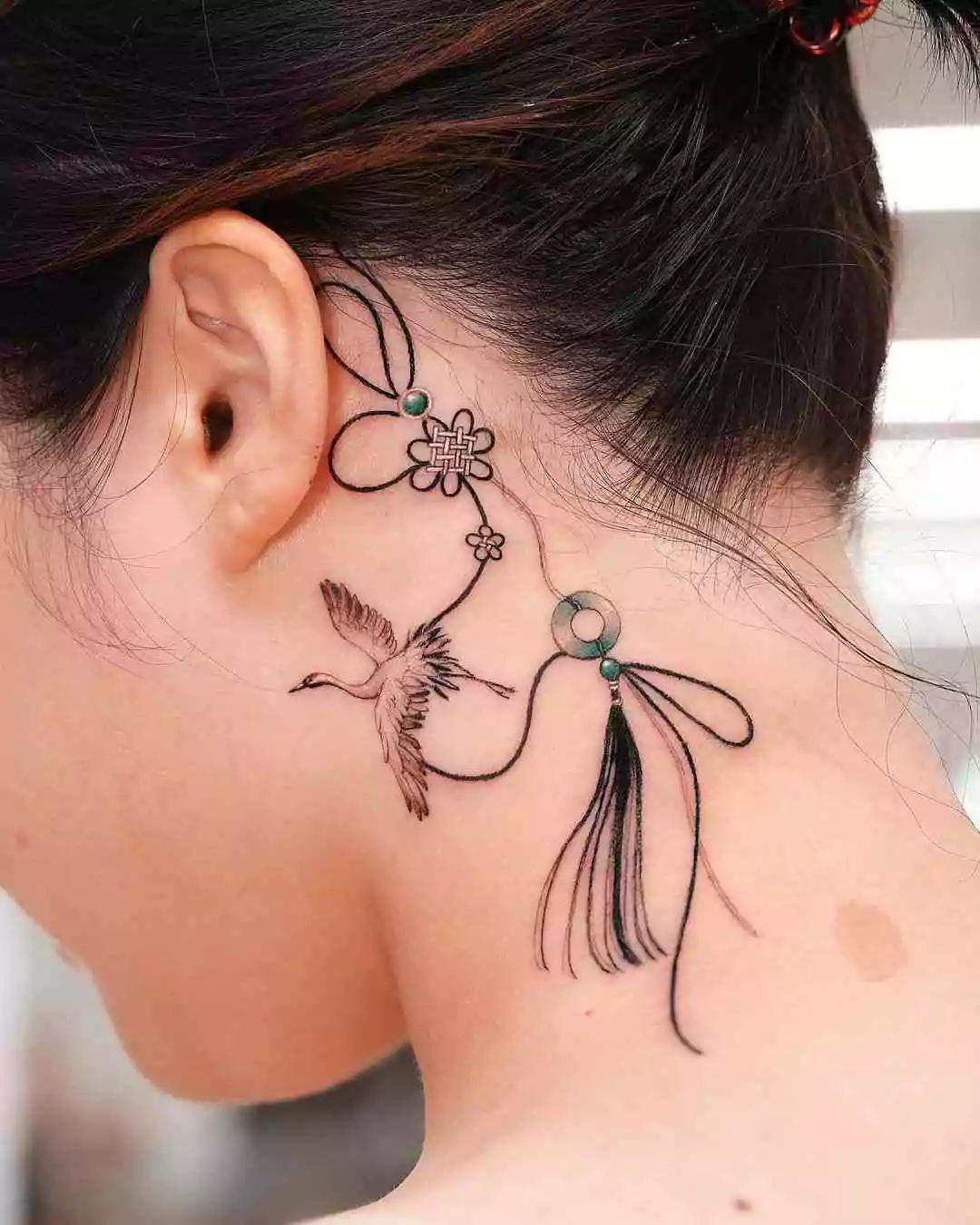 Micro realism neck tattoo for women