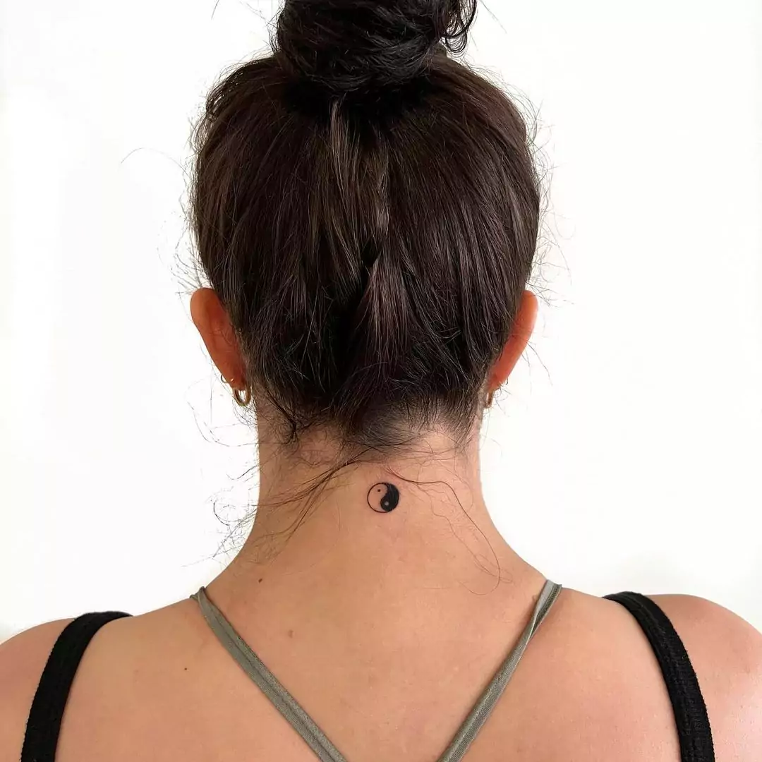 Yin Yang tattoo on the nape