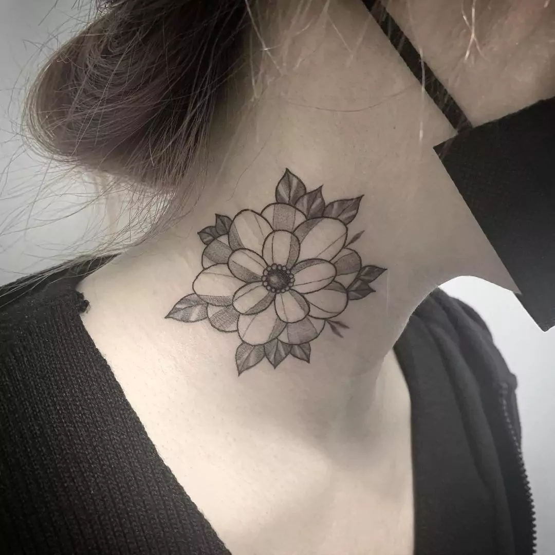 big flower tattoo on the neck